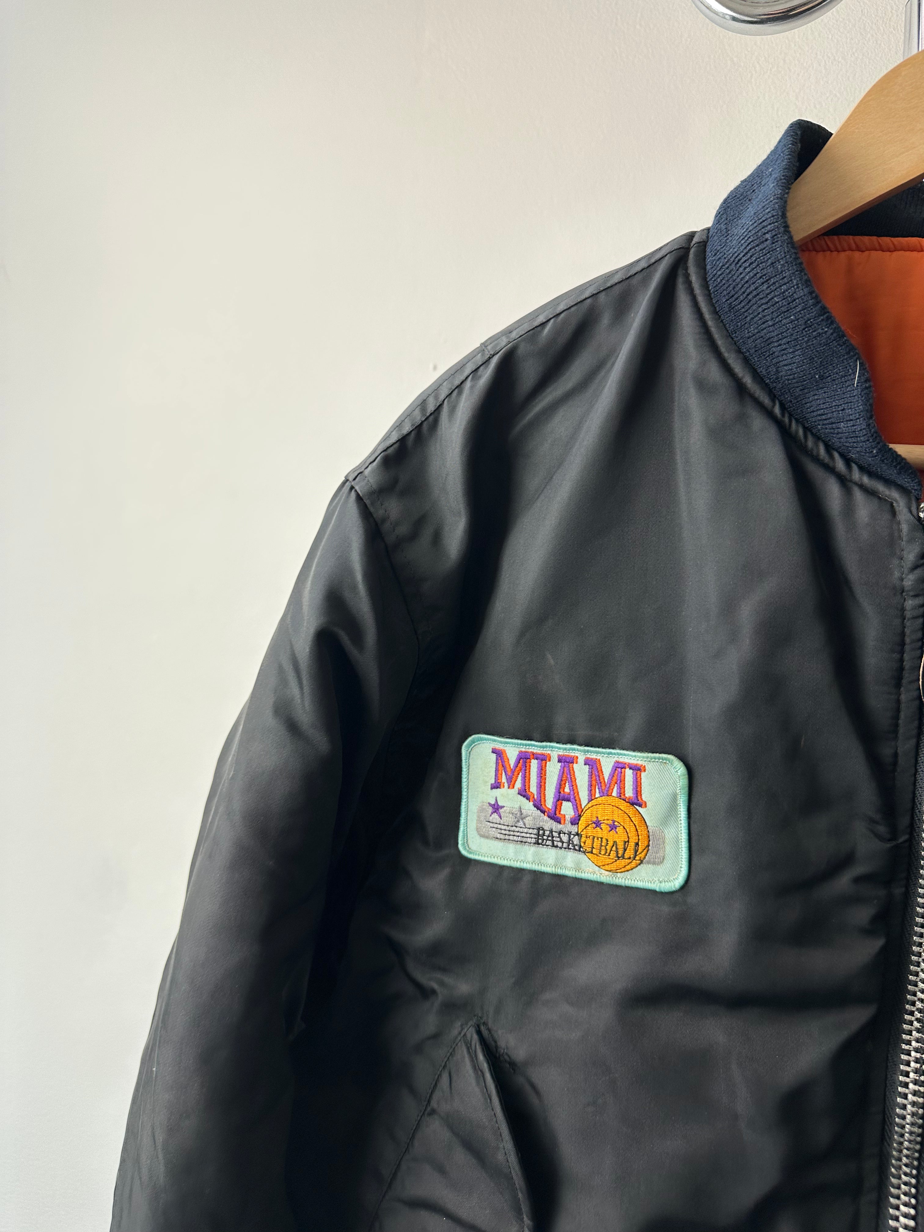 Vintage 1980s Alpha Industries MA-1 “Travel Patched” Bomber - size M/L